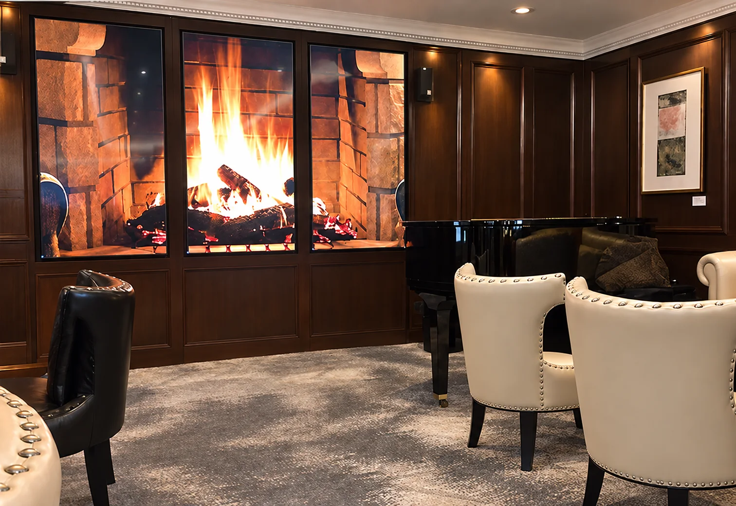 Three synchronized displays in an Azamara Cruises lounge