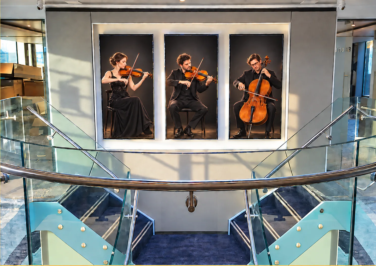 Classical trio on three displays aboard a Lüftner Cruises vessel